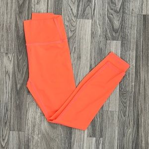 Zyia leggings orange sizes 4 and a 6-8. Both in new condition, only tried on.